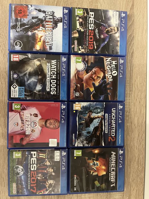 Playstation 4 cu 2 controllere si 8 jocuri