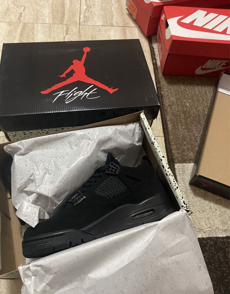 Jordan 4 black cat