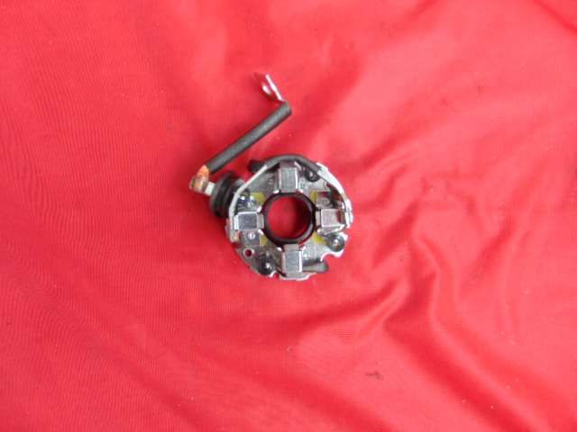 Suport carbuni electromotor Ford Transit 2.4/2.2 Motorkraft