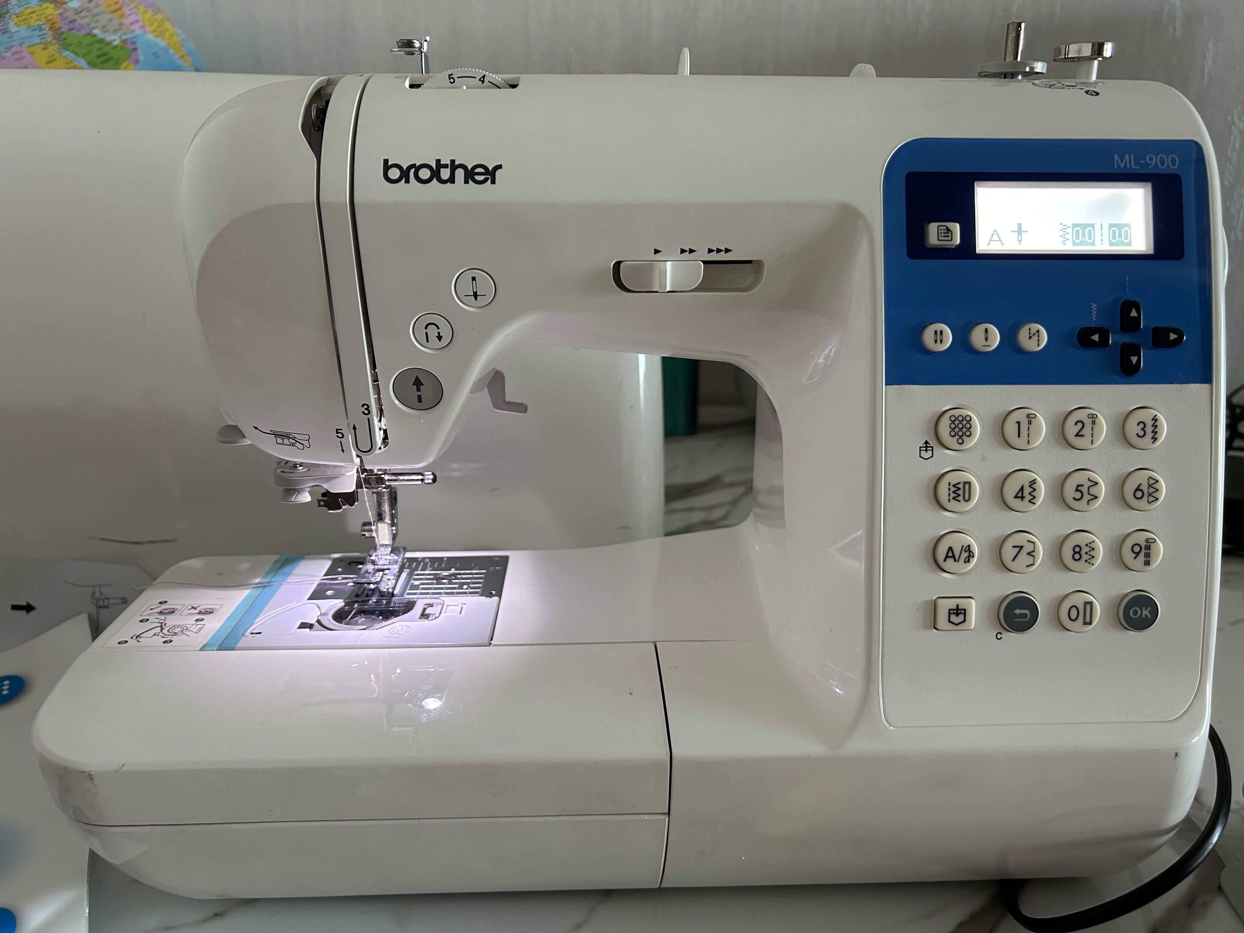 Mașina de cusut și brodat Brother ML-900