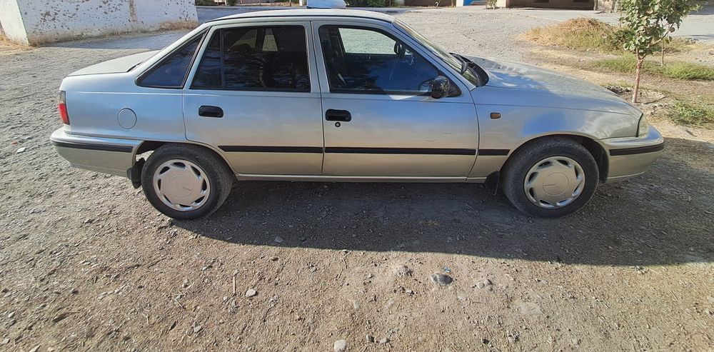 Nexia 1 sotiladi.. 2004 yil. Mator gibrid qilingan