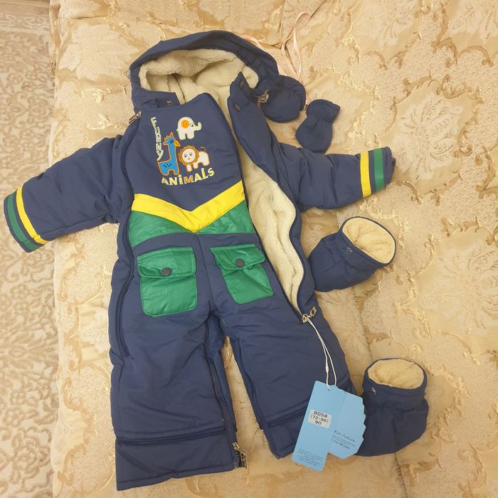 Продам новый детский комбинезон