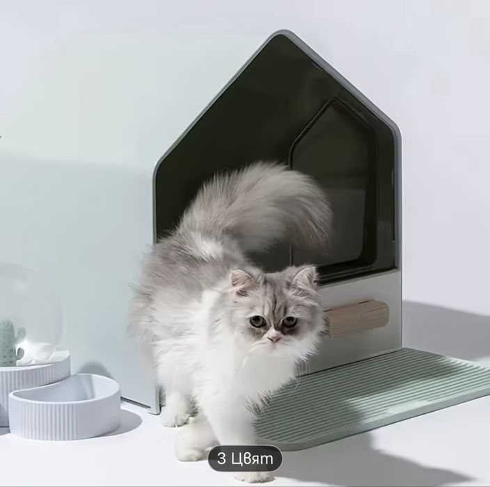 Котешка тоалетна къща