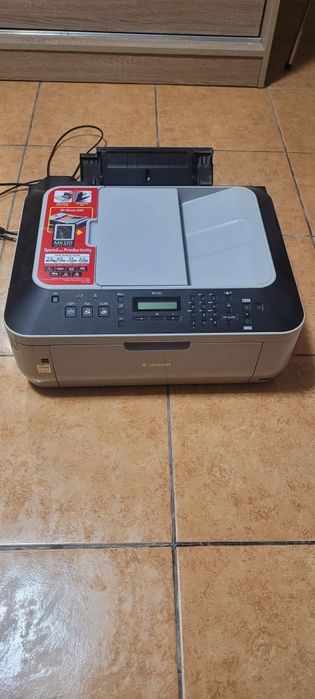 Vând imprimanta Canon MX320