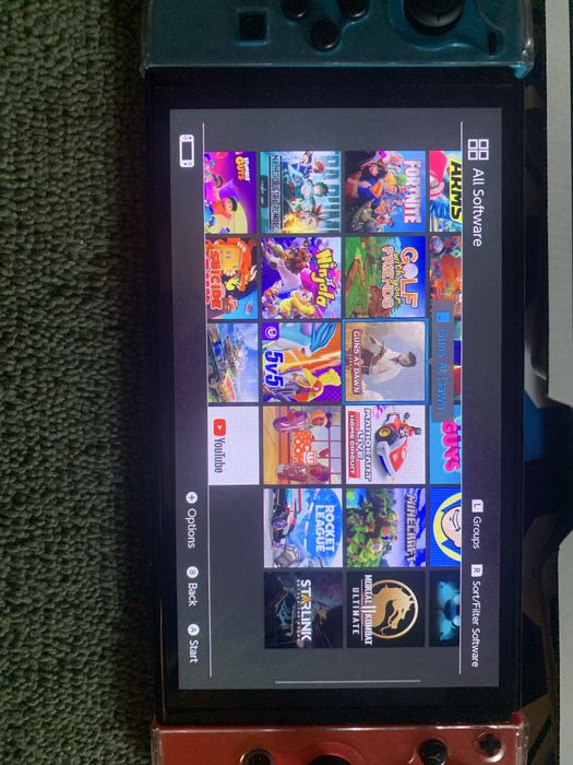 Nintendo swich oled cu foarte multe accesorii VAND URGENT