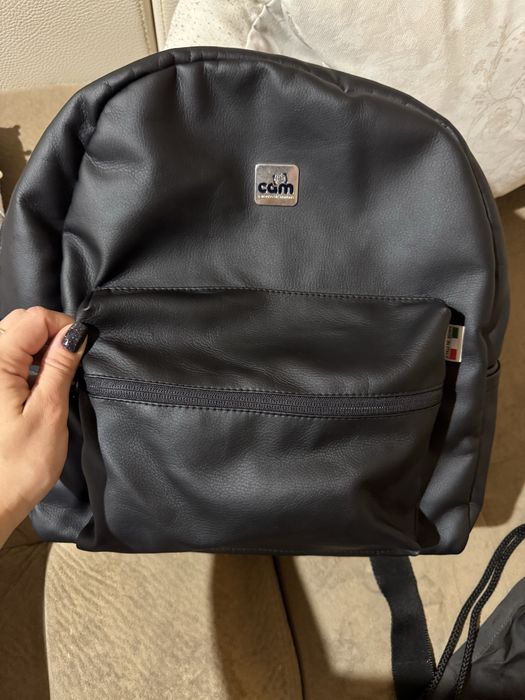 Помпа за кърма и раница за бебешка количка