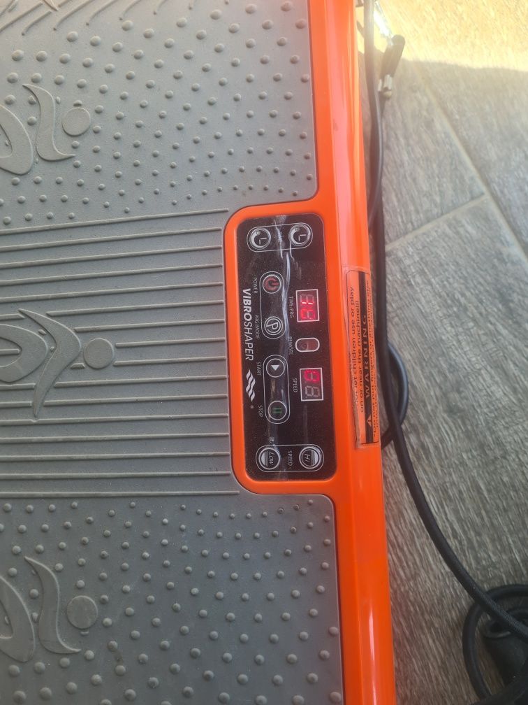 Aparat de masaj vibro Shaper