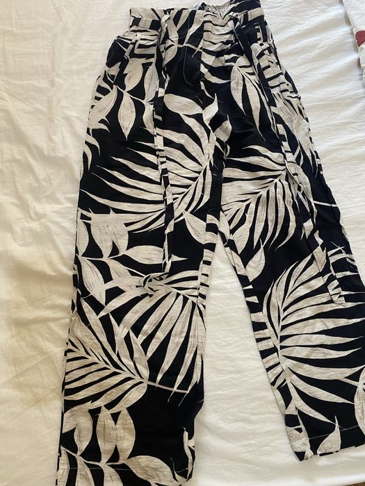 Широк панталон с висока талия Mango