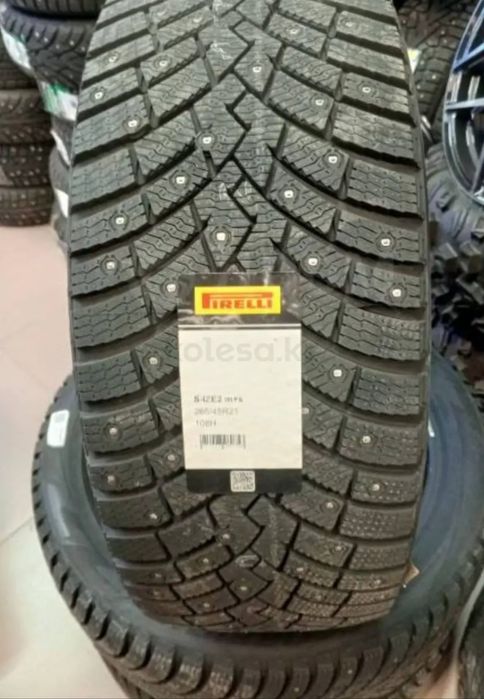 Новые шипованные шины комплект PERELI 265/45 21