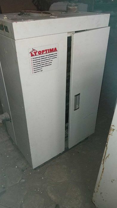 Котел Оптима на свете и газе