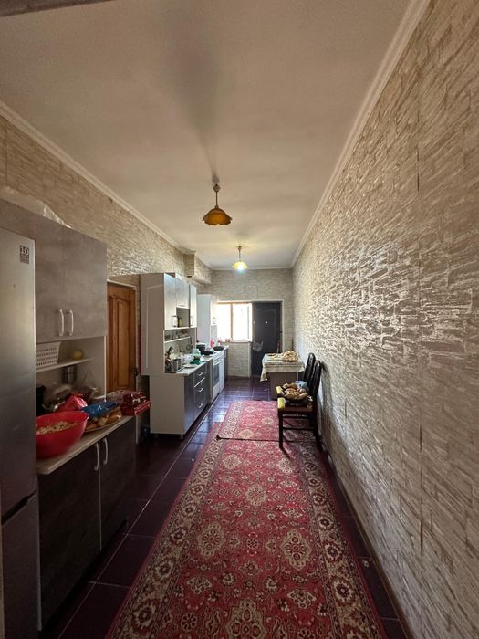 Благоустроенный 2-х этажный дом в микрорайоне "ТАСКЕН", 22,5 сотки.