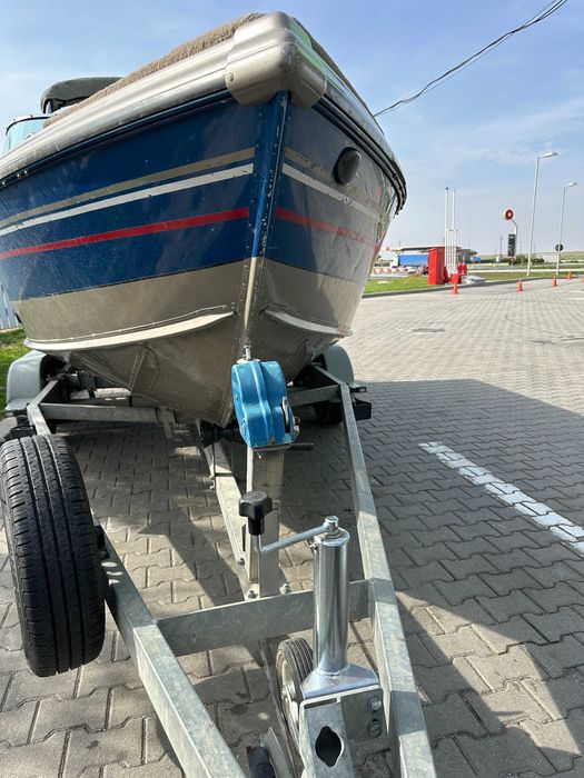 Ambarcatiune LUND 1750 TYEE aluminiu+motor Mercury 150CP+peridoc 2 axe