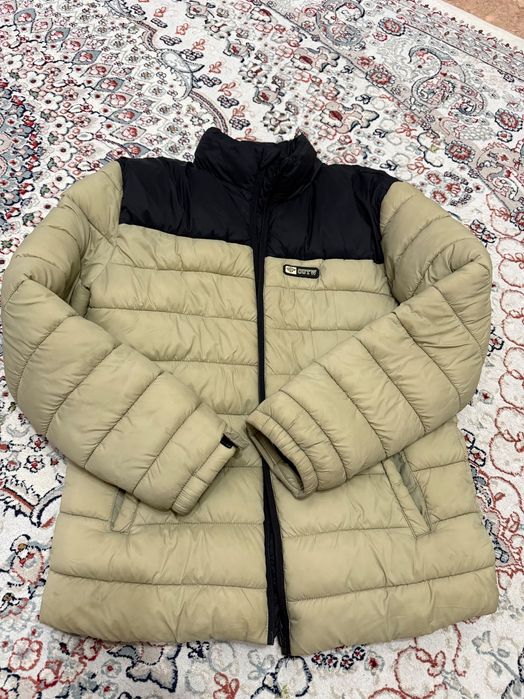 Продам осеннюю куртку на 12-14 лет.