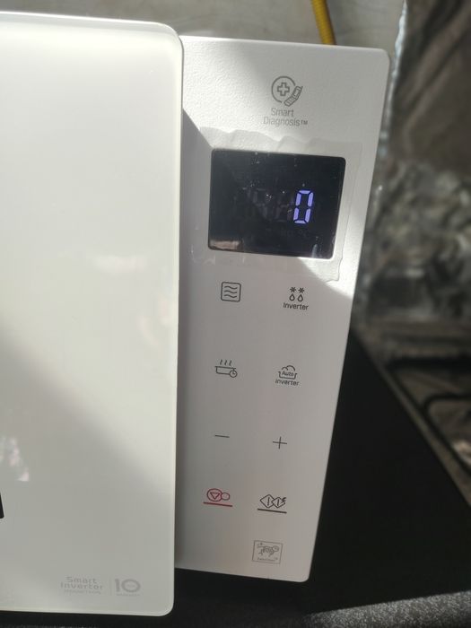 Mikravalnovka  LG  smart inverter yangi ishlatilmagan