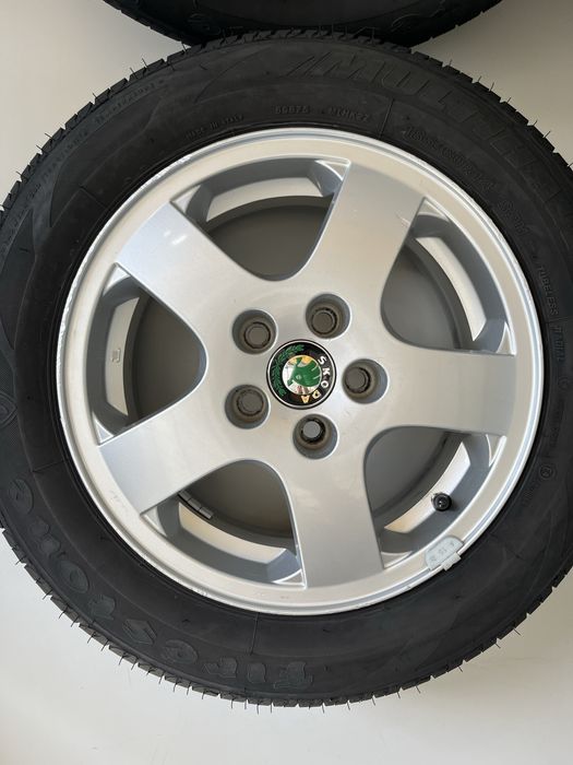 Оригинални джанти 14 цола 5х100 за Шкода/Skoda с летни гуми 185/60/14
