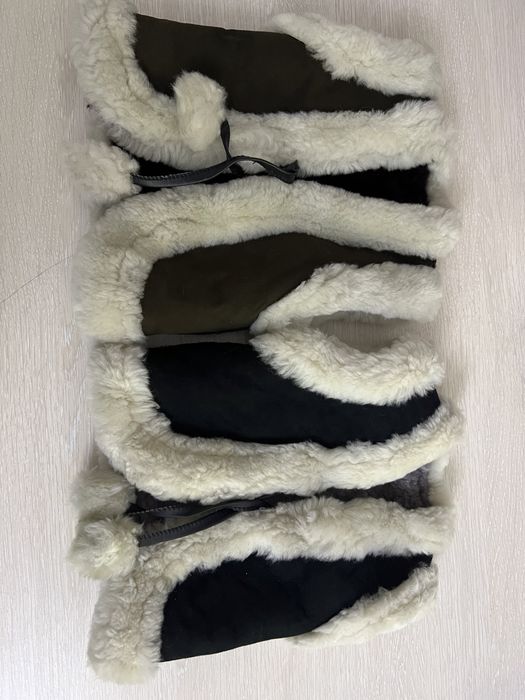 Меховые жилетки