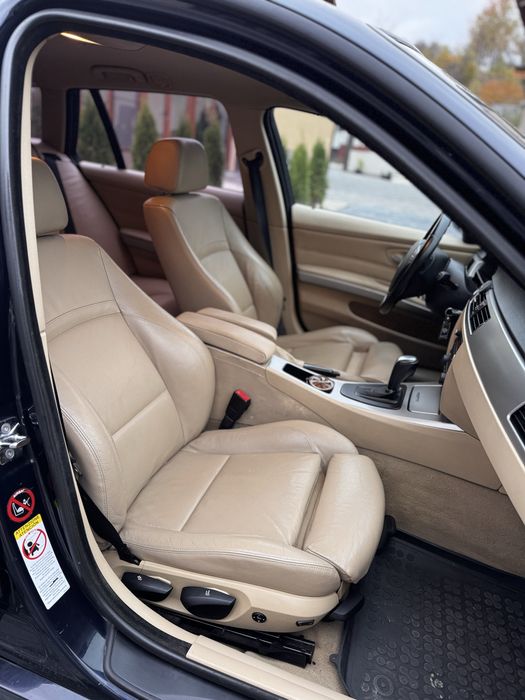 Bmw e91 - cutie automata - interior piele crem - faruri custom
