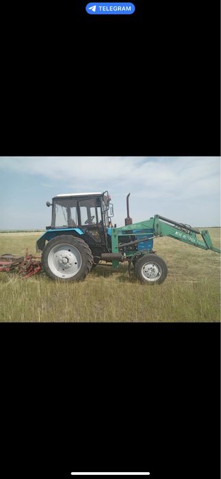 Продам трактор с куном в комплекте лопата и вилы в отличном состоянийй