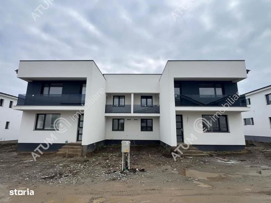 Casa cu 4 camere 2 bai curte de 50 mp zona Calea Cisnadiei Sibiu