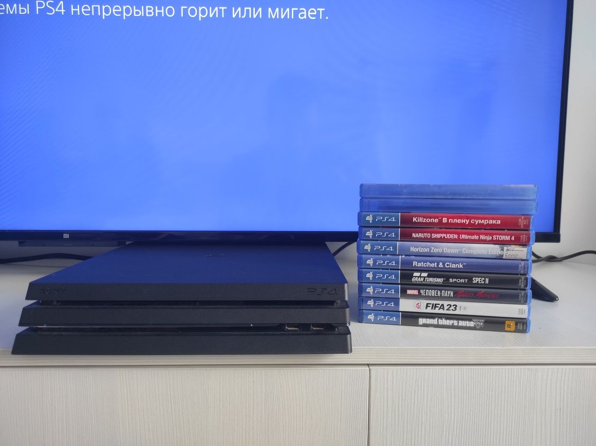 Продам Sony PS4 PRO с дисками!