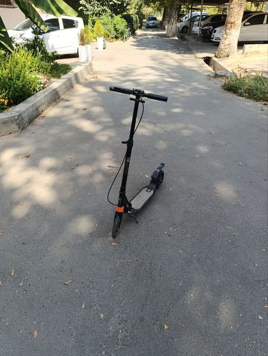 Самокат почти новый горячая цена