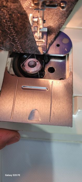 Mașina de cusut Singer