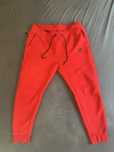 Vand Pantaloni Rosii Nike Tech