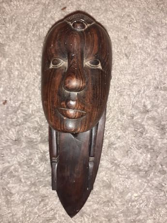Aplica veche din lemn motive africane
