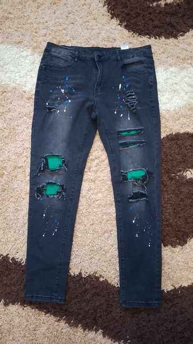 Pantaloni negri rupți de bărbați