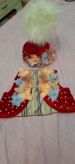 Продам саукеле и комзол на годик тысау кесер