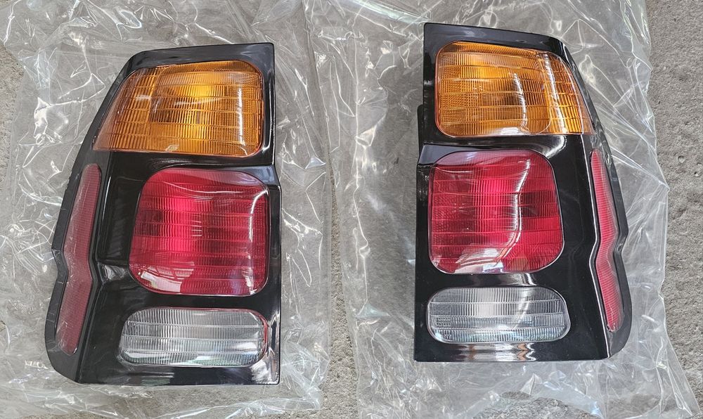 Продам новые задние фонари на Mitsubishi Montero Sport