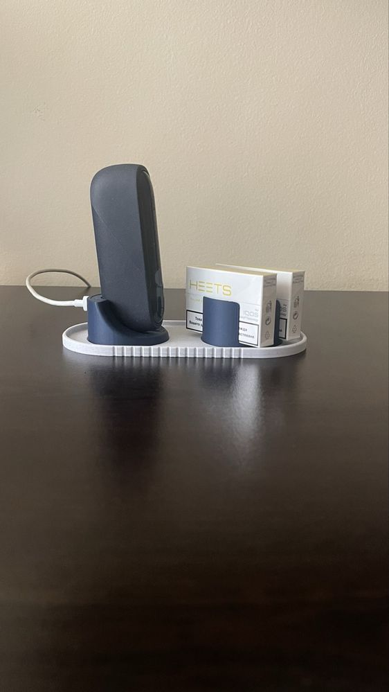 Контейнер за стикове IQOS и зарядна станция