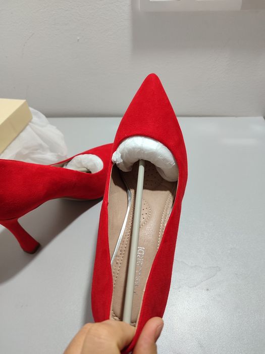 Красные туфли новые