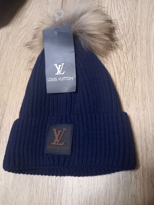 Căciulă  moț blana