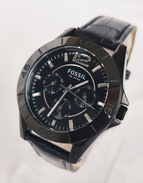 Ceas bărbătesc Fossil CE1003 ceramic, cu quartz si curea din piele.