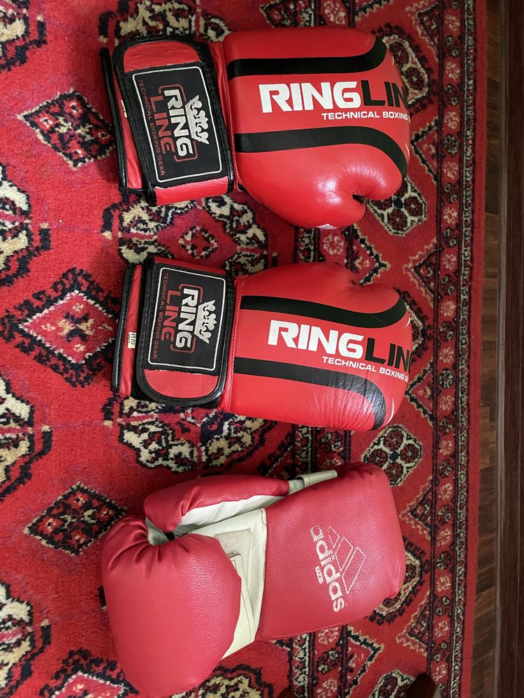 Tekinga yonidagi qizil perchatka bilan sport bintini qoshib beraman
