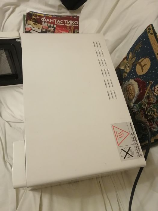 Микровълнова печка Midea с добавен грил.