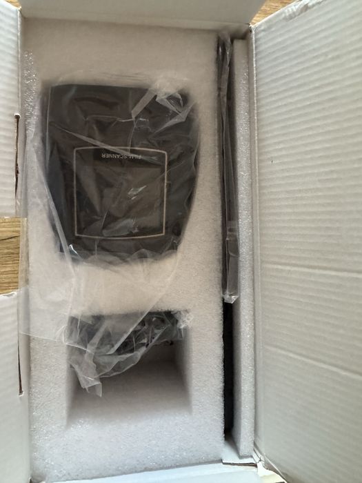 Скенер за филми неотварян