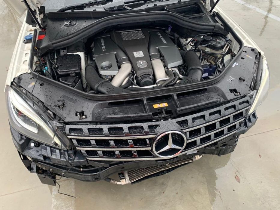 Dezmembrez ml 63 amg w166/bara spate amg/faruri ils/usi/capota/motor/