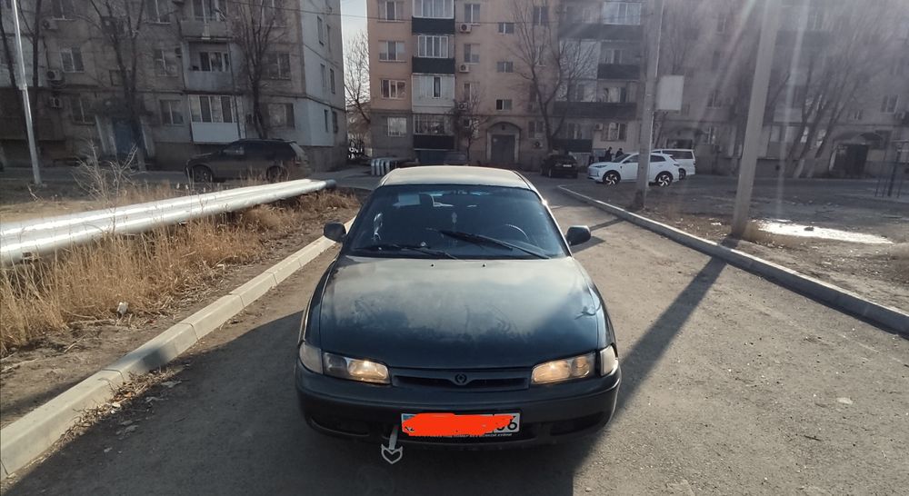 Продаёт Мазда Кронос 1996 года