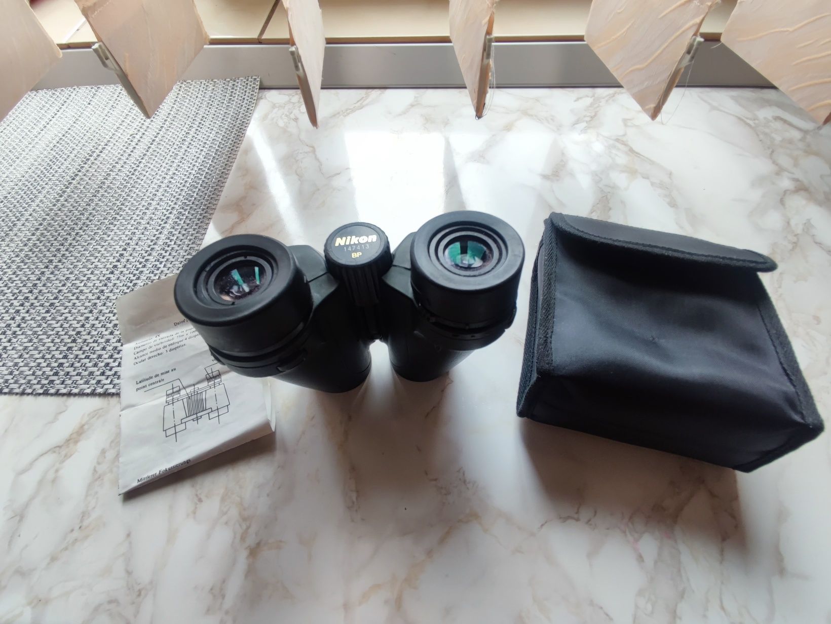BINOCLU NIKON 
Detalii conținut