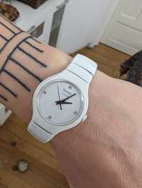 Rado дамски керамичен бял часовник  Jubile c 4 диаманта. Употребяван.