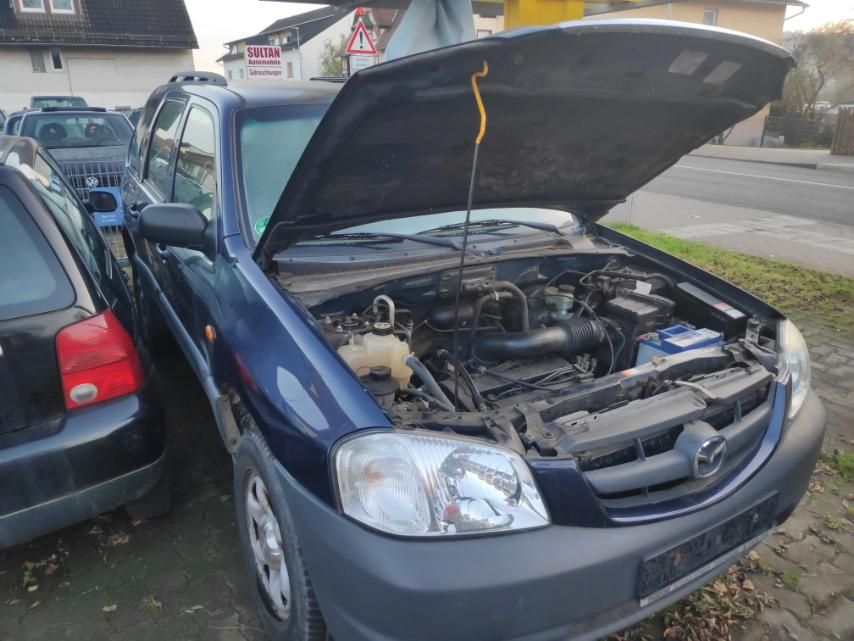 Мазда Трибют на части