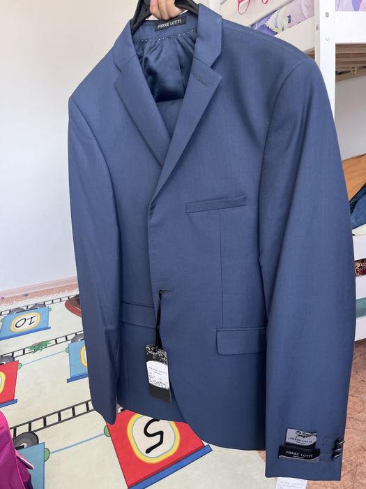 Продам новый костюм