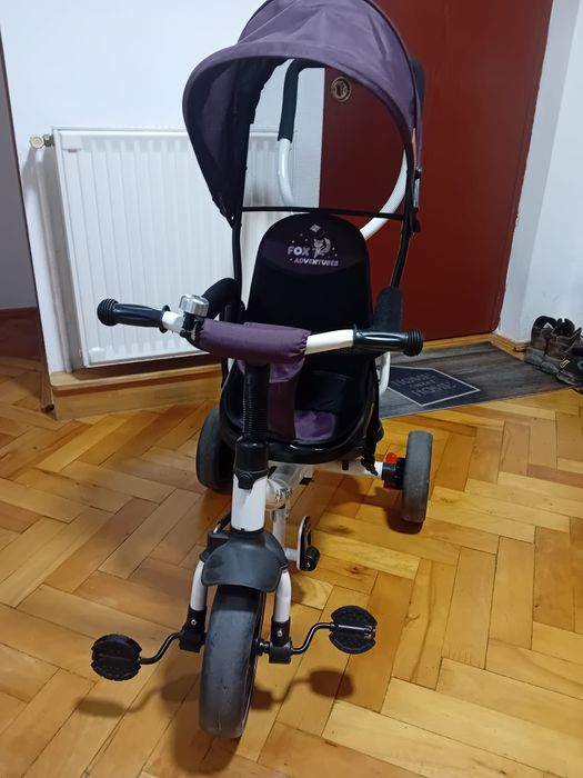 Vând tricicleta ca noua