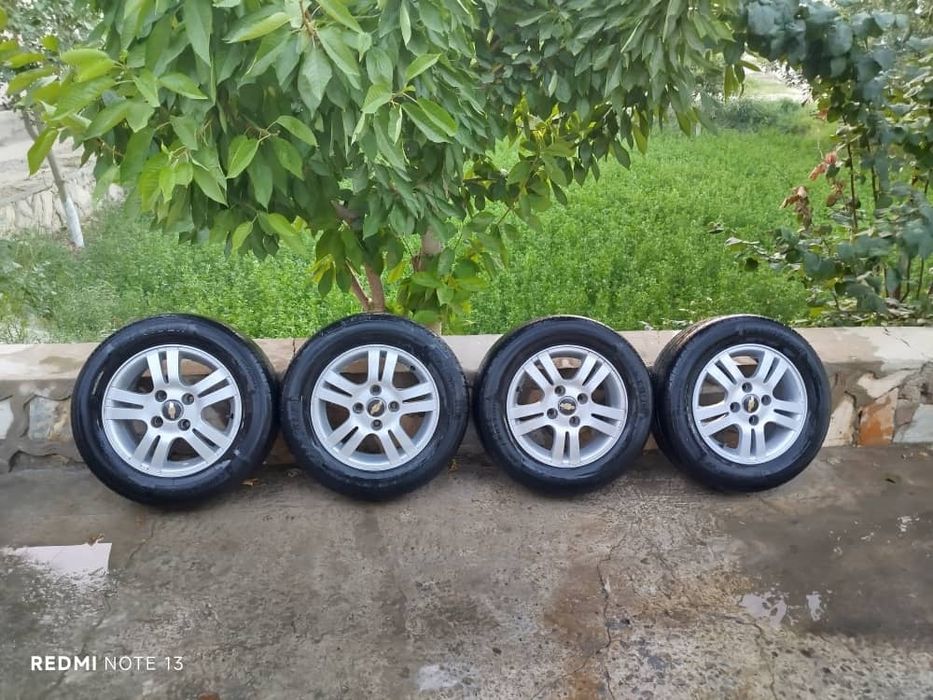 Продам  диски  с резиной.