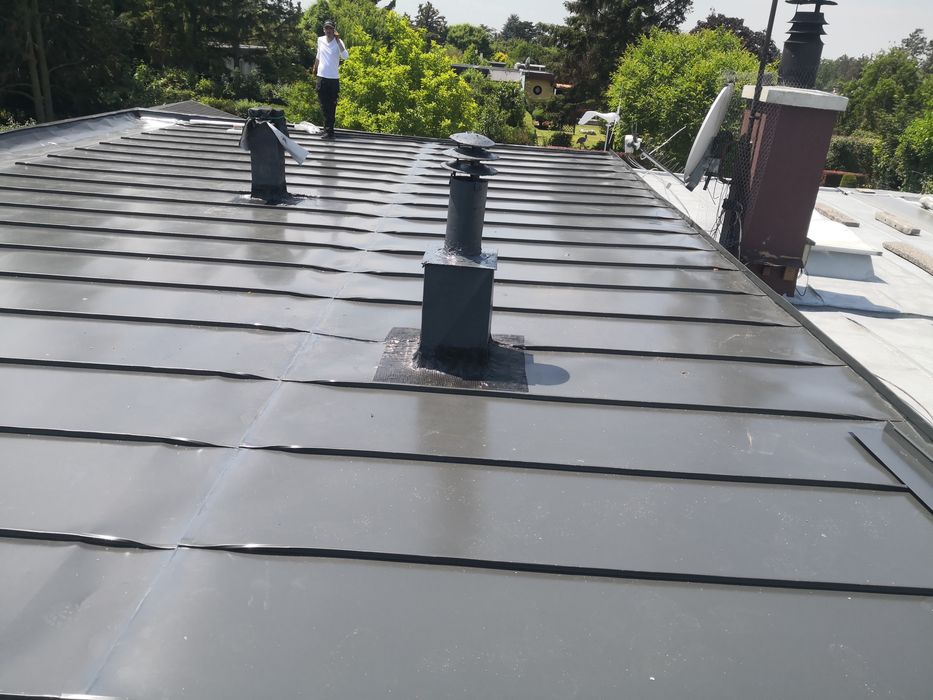 Tigla metalica bilka velux jgheaburi acoperis montaj reparatii
