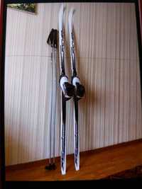 Продам лыжный комплект (лыжи-высота 180 с м,крепление ,палки-высота