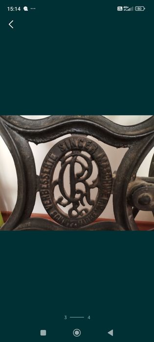 Mașină de cusut singer