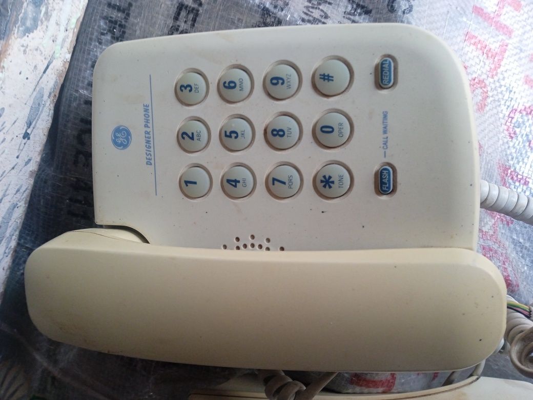 Радиотелефон Panasonic и стационарный телефон